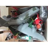 Box of toy rockets and planes