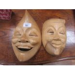 2 wooden masks