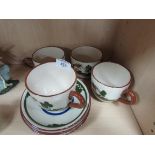 4 pottery cups and saucers