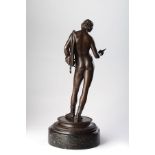 A FINE BRONZE FIGURE OF NARCISSUS A 19th century Italian bronze figure of Narcissus after the