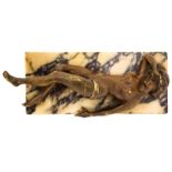 An Amusing Antique Argentinean Cigar Cutter A novelty cigar cutter in the form of a bronze figure of