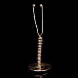 A Gold Contraceptive Coil,