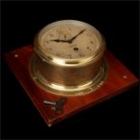 A Ship's Bulkhead Clock,