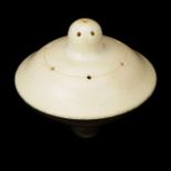 An Ivory Nipple Shield,