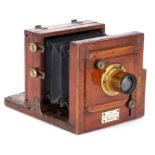 A Photographica Supply Association Quarter Plate Mahogany Tailboard Camera,