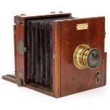 An A & G Taylor Half Plate Mahogany Tailboard Camera,