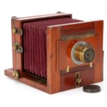 A Reyolds & Branson Studio Half Plate Mahogany Tailboard Camera,