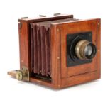 A Hunter & Sands 4x5 Mahogany Tailboard Camera,