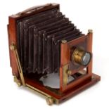 An Express Photo Company 'English' Half Plate Mahogany Field Camera,