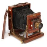A Houghtons Victo Half Plate Mahogany Field Camera,