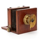 A Swift & Son Simple 4x5" Mahogany Tailboard Camera,