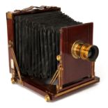 A McKellen Triple Patent Whole Plate Mahogany Field Camera,