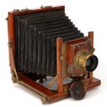An Unmarked Half Plate Mahogany Field Camera,