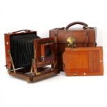 A Thornton-Pickard Imperial Triple Extension Half Plate Mahogany Field Camera,