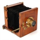 An Unmarked Half Plate Mahogany Tailbaord Camera,