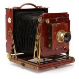A Thornton-Pickard Royal Ruby Half Plate Mahogany Field Camera,