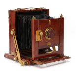 A Hinton & Co Half Plate Mahogany Field Camera,