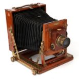 A Houghtons Tropical Victo Half Plate Teak Field Camera,