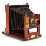 A Percy Lund & Co. 'St John' Half Plate Mahogany Tailboard Camera,