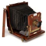 An E & T Underwood 'The Field' Half Plate Mahogany Field Camera,