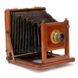 A Pearson & Denham 'The Londis' Half Plate Mahogany Field Camera,