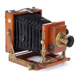 A Boots Cash Chemists Quarter Plate Mahogany Camera,