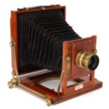 A McGhie & Co. Triple Extension Half Plate Mahogany Field Camera,