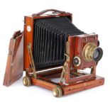 A Thornton-Pickard Praetor Quarter Plate Mahogany Field Camera,