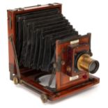 An E & T Underwood 'The Club' Half Plate Mahogany Field Camera,