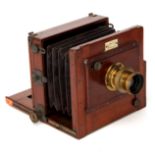 An E. Marlow Half Plate Mahogany Tailboard Camera,