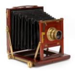 A Westminster Photographic Exchange Ltd Half Plate Mahogany Field Camera,