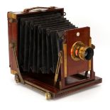 A Sun Camera Co. Ltd Half Plate Mahogany Field Camera,