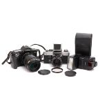 A Canon EOS 650 SLR Camera,