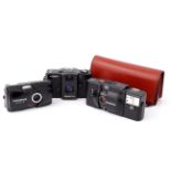 Three Compact Cameras,