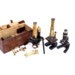 Three Cased Microscopes,