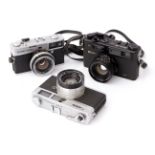 Three Compact Rangefinder Cameras,