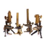 Four Incomplete Compound Microscopes,