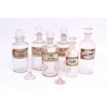 A Collection of Glass Chemical Bottles,