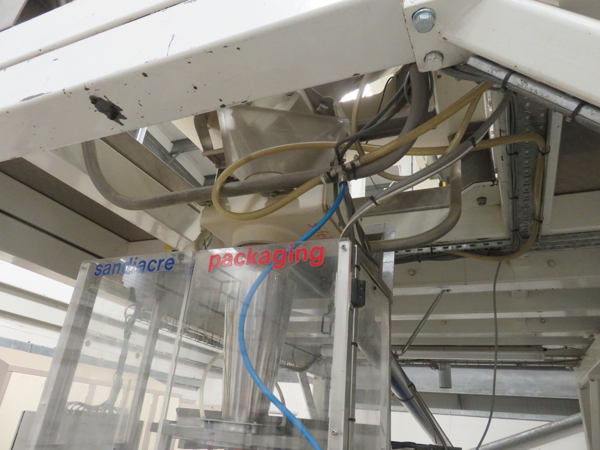 A complete packing line: FMC Foodtech vibratory feeder 2mtr x 300mm wide, FMC bucket elevator 5 mtr - Image 18 of 27