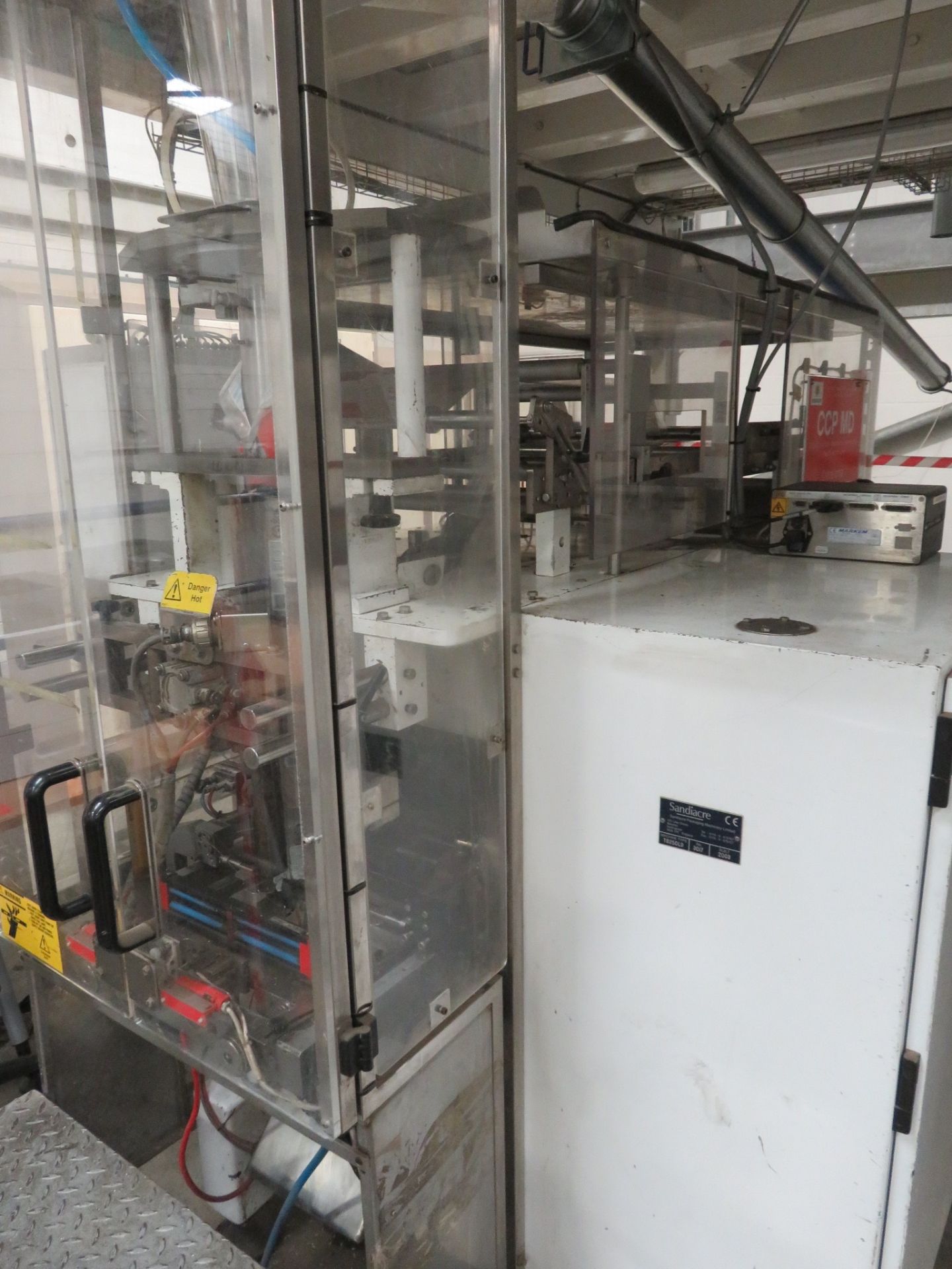 A complete packing line: FMC Foodtech vibratory feeder 2mtr x 300mm wide, FMC bucket elevator 5 mtr - Image 24 of 27