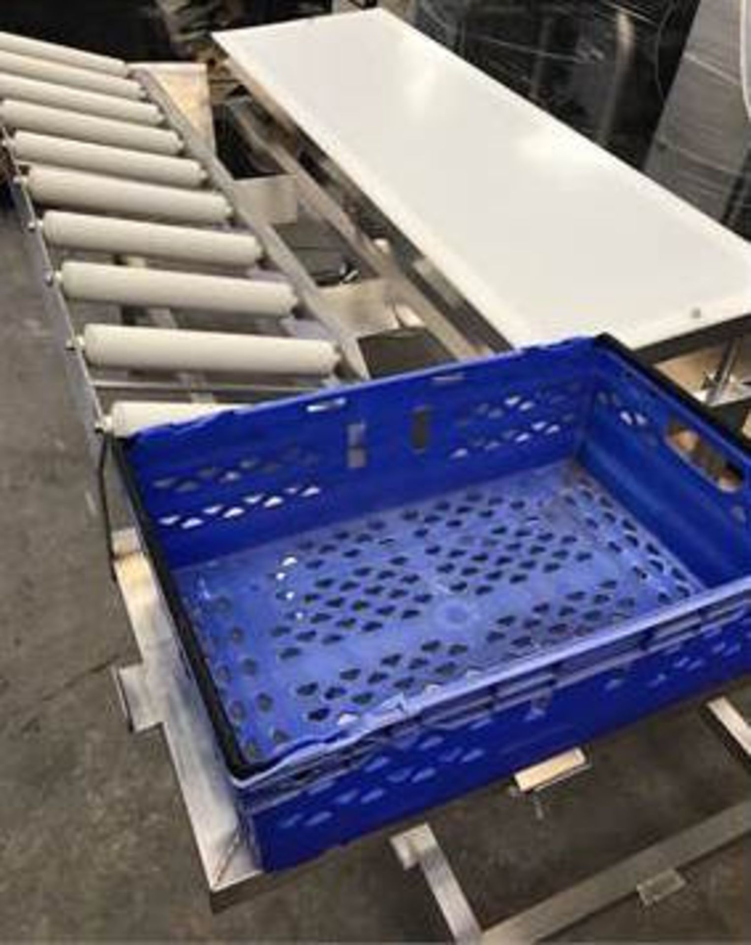 Packing Table. 1.5 metres long x 1 metre wide x 900mm high. With roller conveyor and basket.Lo£5