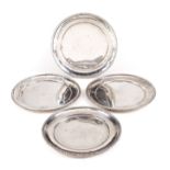 A set of four Italian silver coloured plates