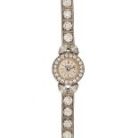 Piaget, ref. 2301, a lady's 18 carat white gold and diamond bracelet wristwatch