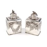 A pair of Queen Anne Britannia standard silver tea caddies by Gabriel Sleath