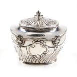 An Edwardian silver oval tea caddy by William Hutton & Sons Ltd.