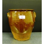 A brown glazed stoneware crock, 24cm high