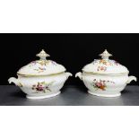 A pair of 19th century continental sauce tureens and covers, each with an ozier moulded border and