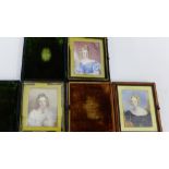 Three leather cased portrait miniatures / each depicting a young woman with ringlets in her hair, 12