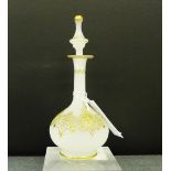 An opaque glass scent bottle and stopper with gilt classical pattern, 21cm high