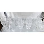 A quantity of cut glass to include a bell, candlesticks, butter dishes, vases etc, (a lot)